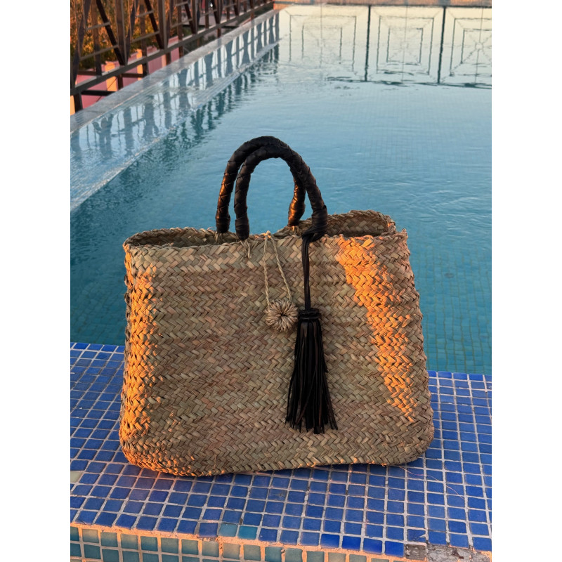 Basket with leather handles to carry by hand. Black